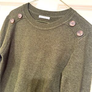 Slim fit olive crewneck sweater with button accessory on each shoulder.